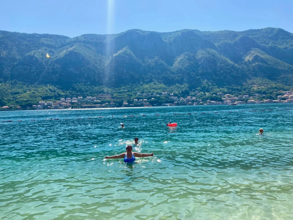 People swimming at Kotor Beach.