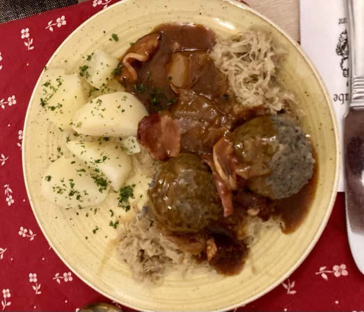 German meal of meatballs with potatoes and gravy