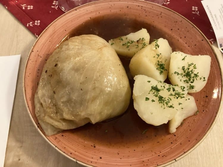 German meal of stuffed cabbage with potatoes