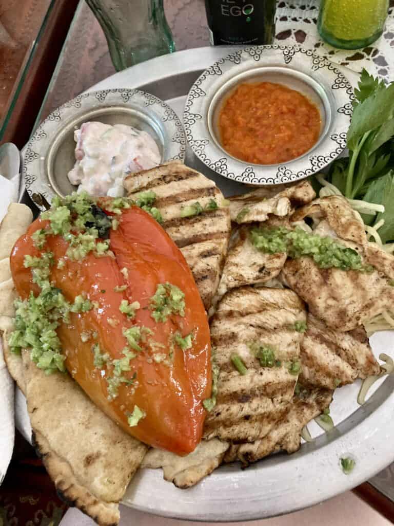 Red pepper, grilled chicken, and two sauces in Mostar, Bosnia and Herzegovina