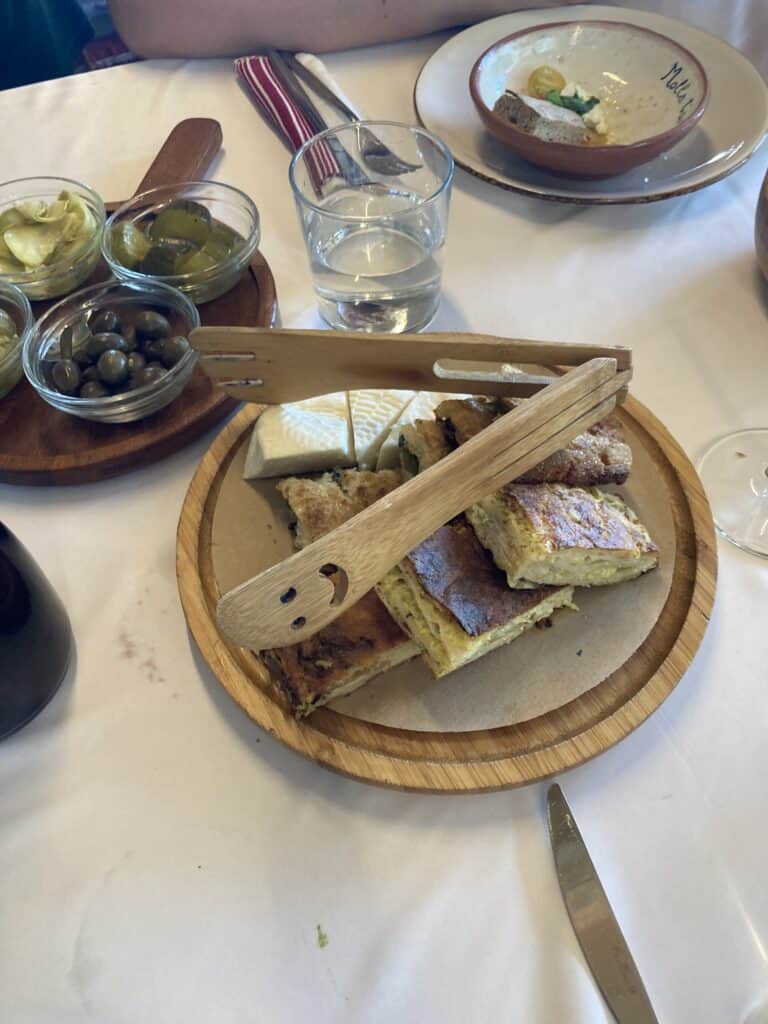 Albanian pastries with a serving tongs