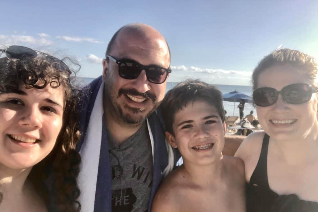 A family of four on the beach in Mexico