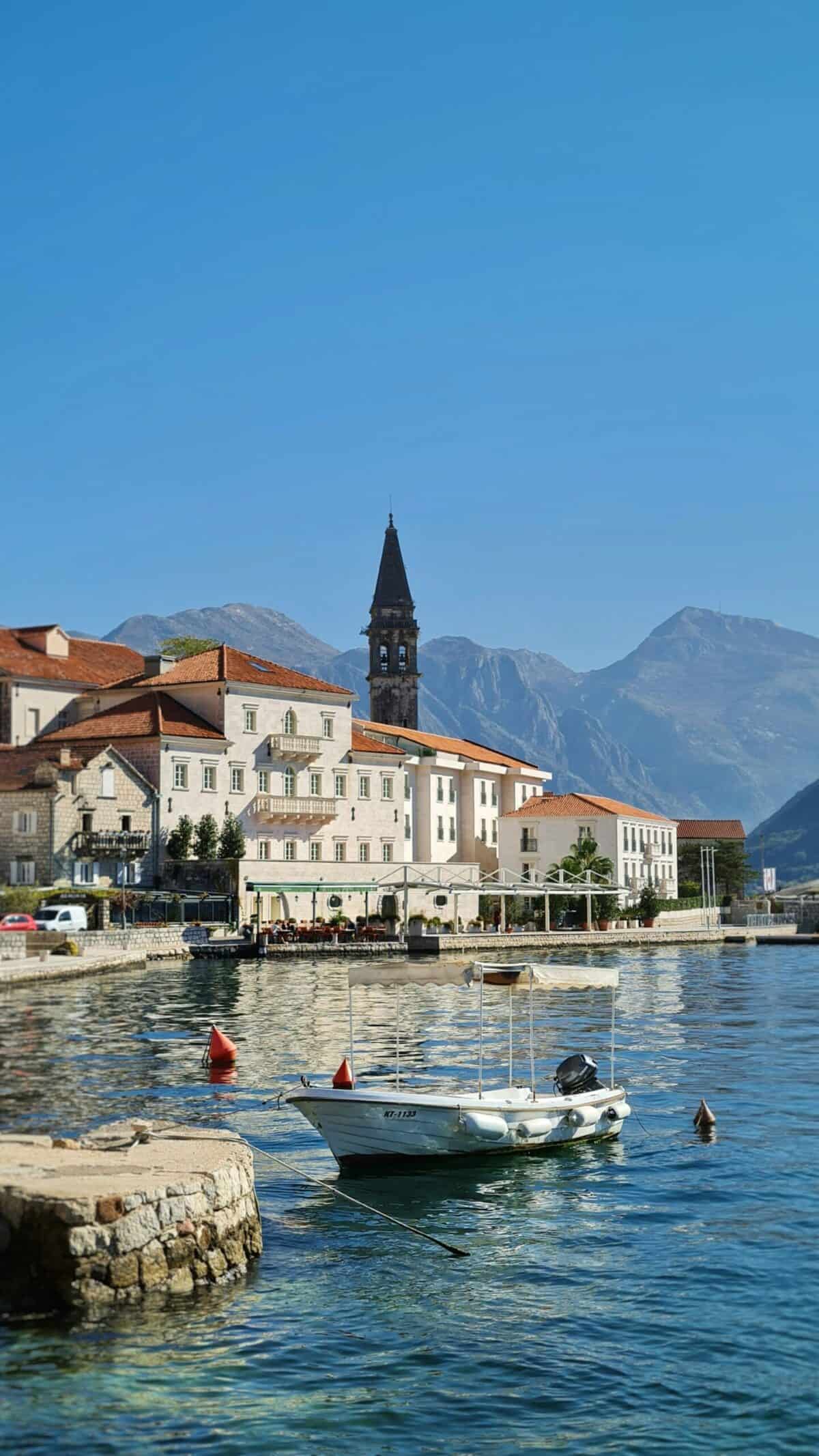 View of a boat in front of a building in Perast, Montenegro