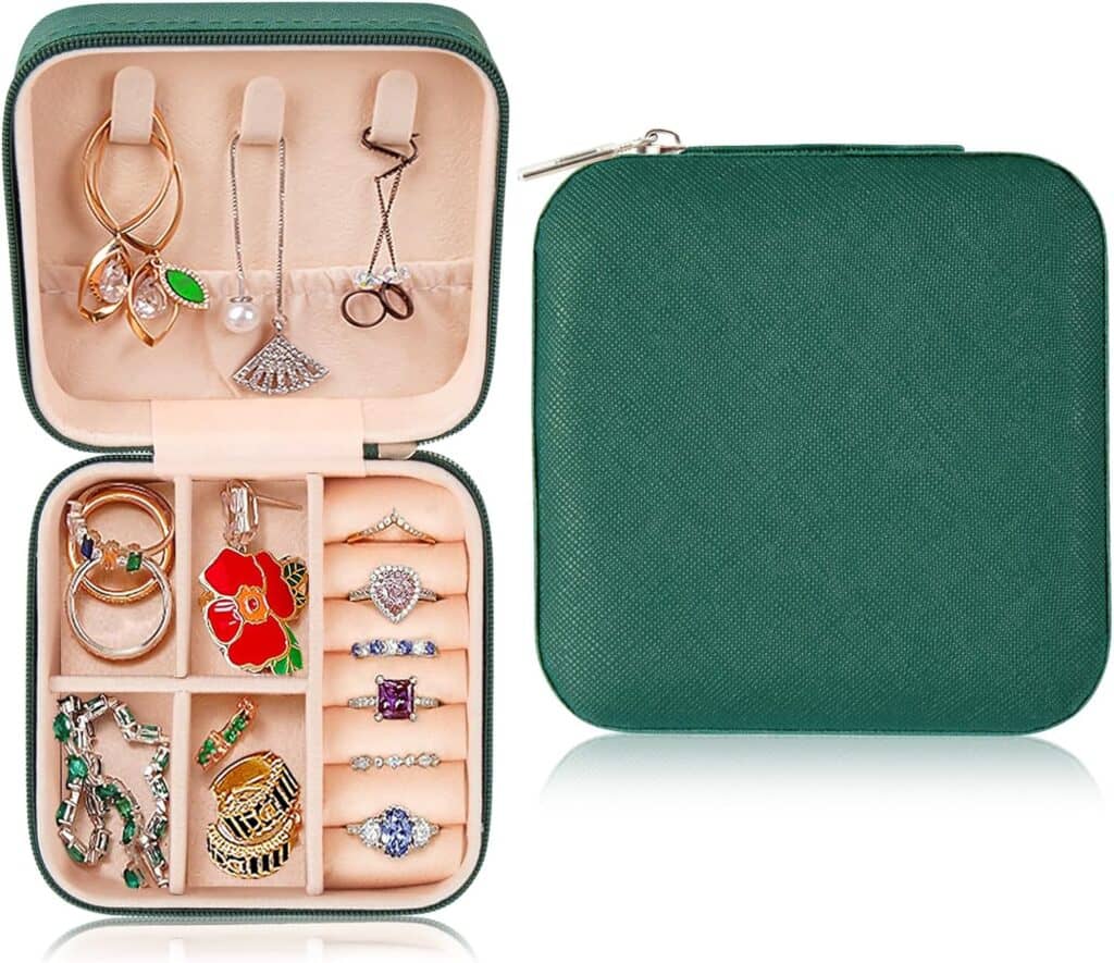 Small green case full of jewelry