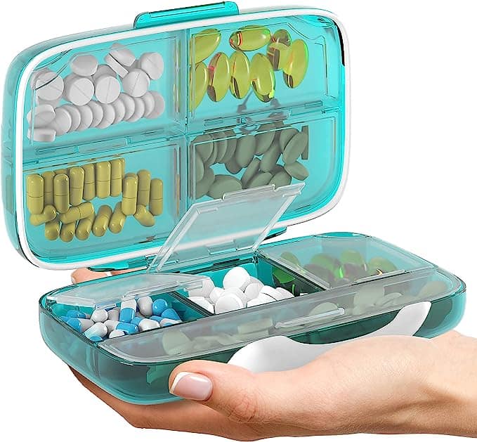 Green container full of pills