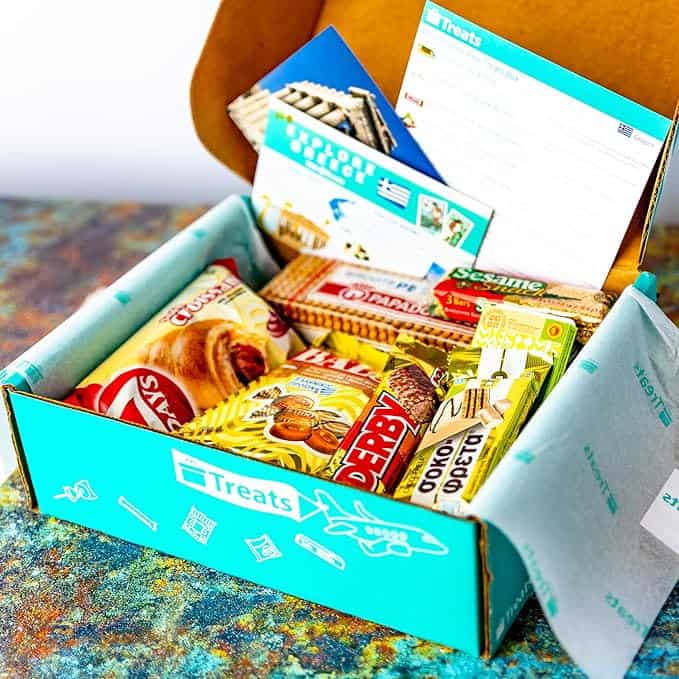 Blue box full of snacks and treats